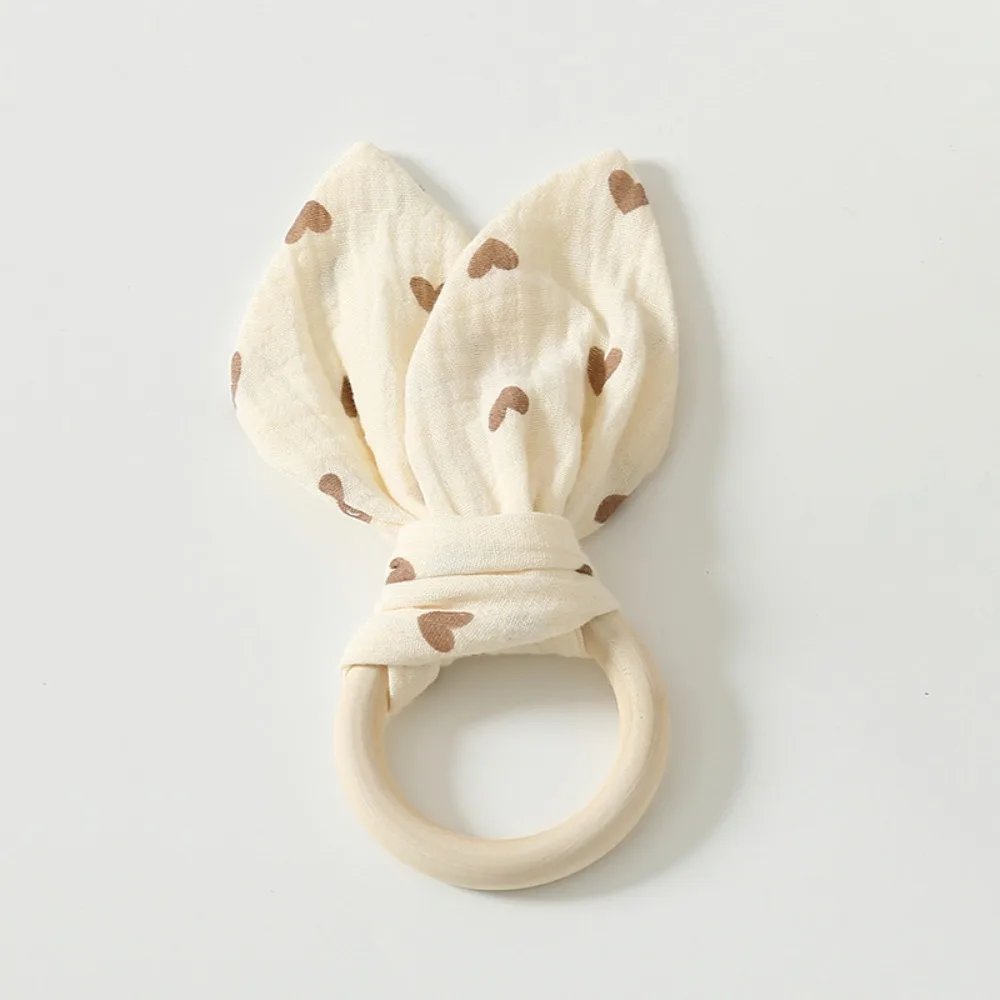 

Soft Baby Wooden Hand Grasp Toy Natural Wooden Rabbit Ears Newborn Teething Ring Bracelet Rattle Sensory Toy Chewing Appease Toy