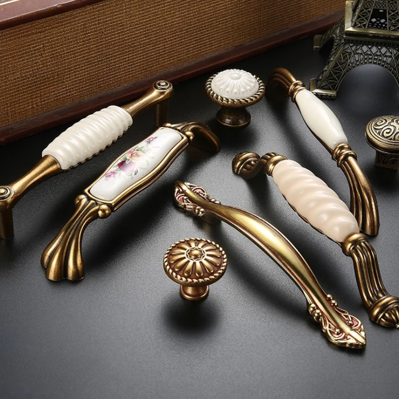 Perillas de cajón, manija de puerta de armario, herrajes para muebles europeos, manijas de gabinete blancas de cerámica de bronce antiguo de aleación de Zinc