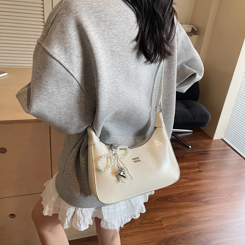 Высококачественная нишевая сумка для подмышек, женская сумка, новинка 2024, модная осенняя модная сумка на плечо, текстурированная сумка для подмышек