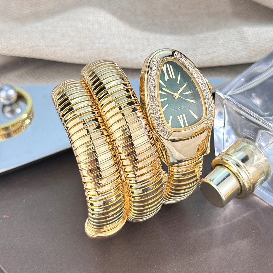 Reloj de cuarzo para mujer con envoltura elástica en forma de serpiente europea y americana a la moda con reloj de pulsera de diamantes integrado