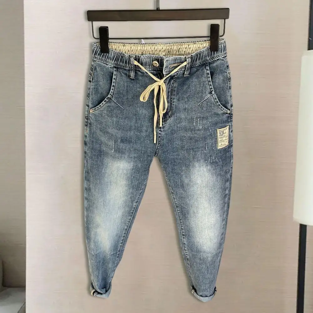 Jeans con coulisse regolabili Jeans Harem da uomo stile Hip Hop elastico in vita pantaloni in Denim con cerniera con coulisse regolabile