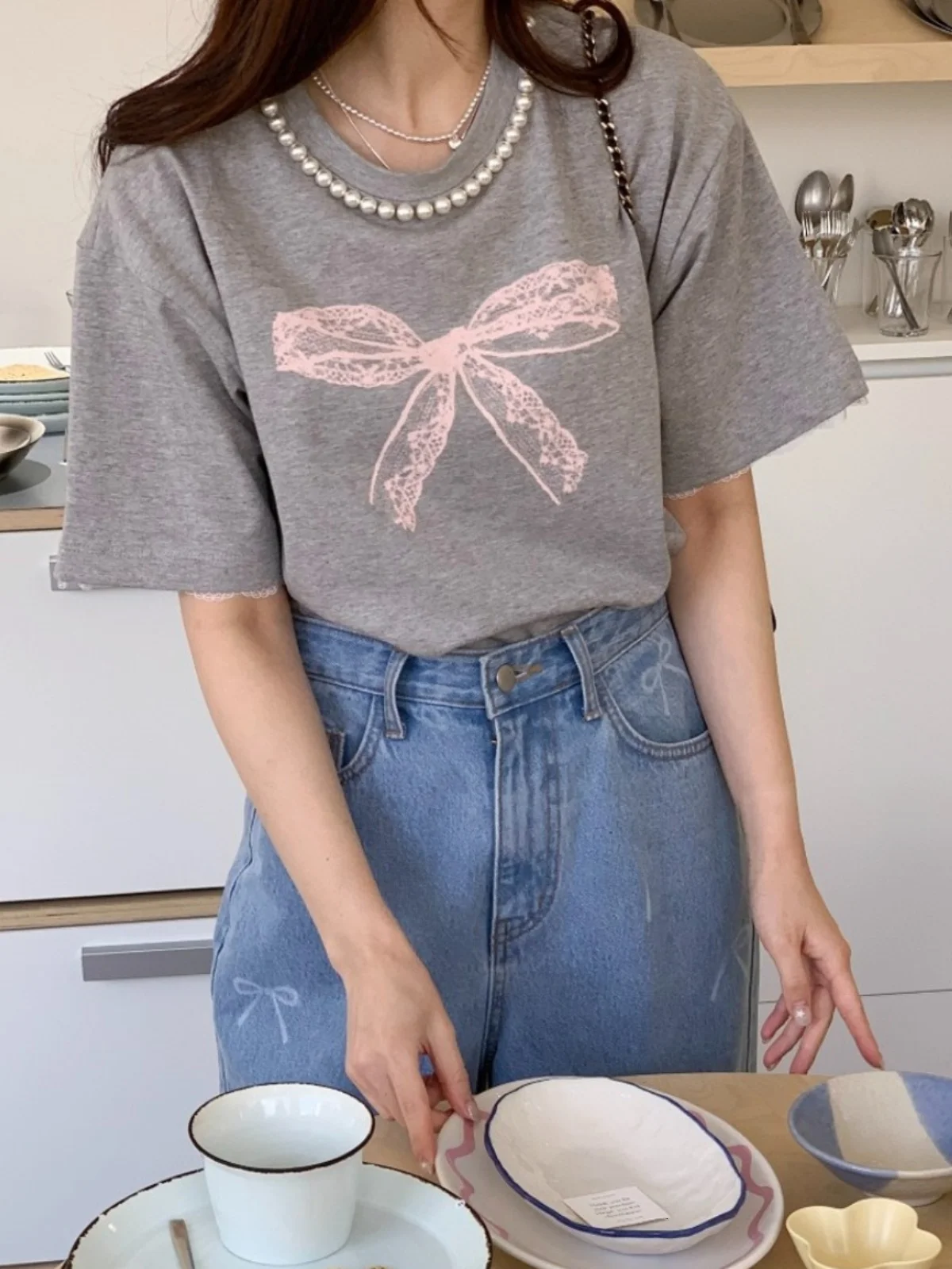 T-shirt da donna estiva nuova con stampa nodo in pizzo ort Sve Pearl round Ne Loose Top coreano Sle Pendolarismo Faion