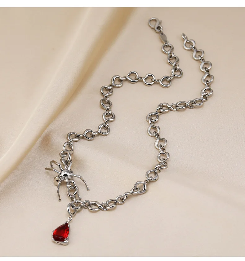 

Titanium steel spider ruby pendant necklace for women, simple bone chain, niche design accessory