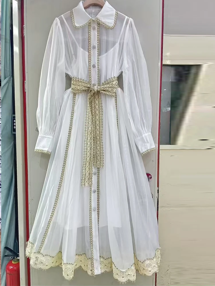 

In the summer of 2025, the new lapel gold embroidered lace bubble short sleeve dress with waist tie and big swing holiday dress.