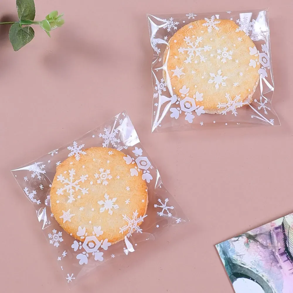 

50Pcs 10x10cm Christmas Snowflake Cookie Bag Plastic Cellophane Self Adhesive Seal Bakery Gift Bags Christmas Snacks Packaging