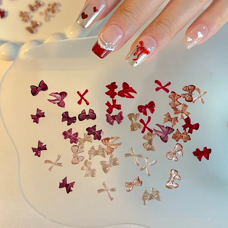 50 ชิ้น ของตกแต่งเล็บเรซิ่นรูปโบว์หลากสีสันน่ารัก ประดับเล็บรูปผีเสื้อ 3 มิติ เครื่องประดับแฟชั่น DIY อุปกรณ์ทำเล็บ