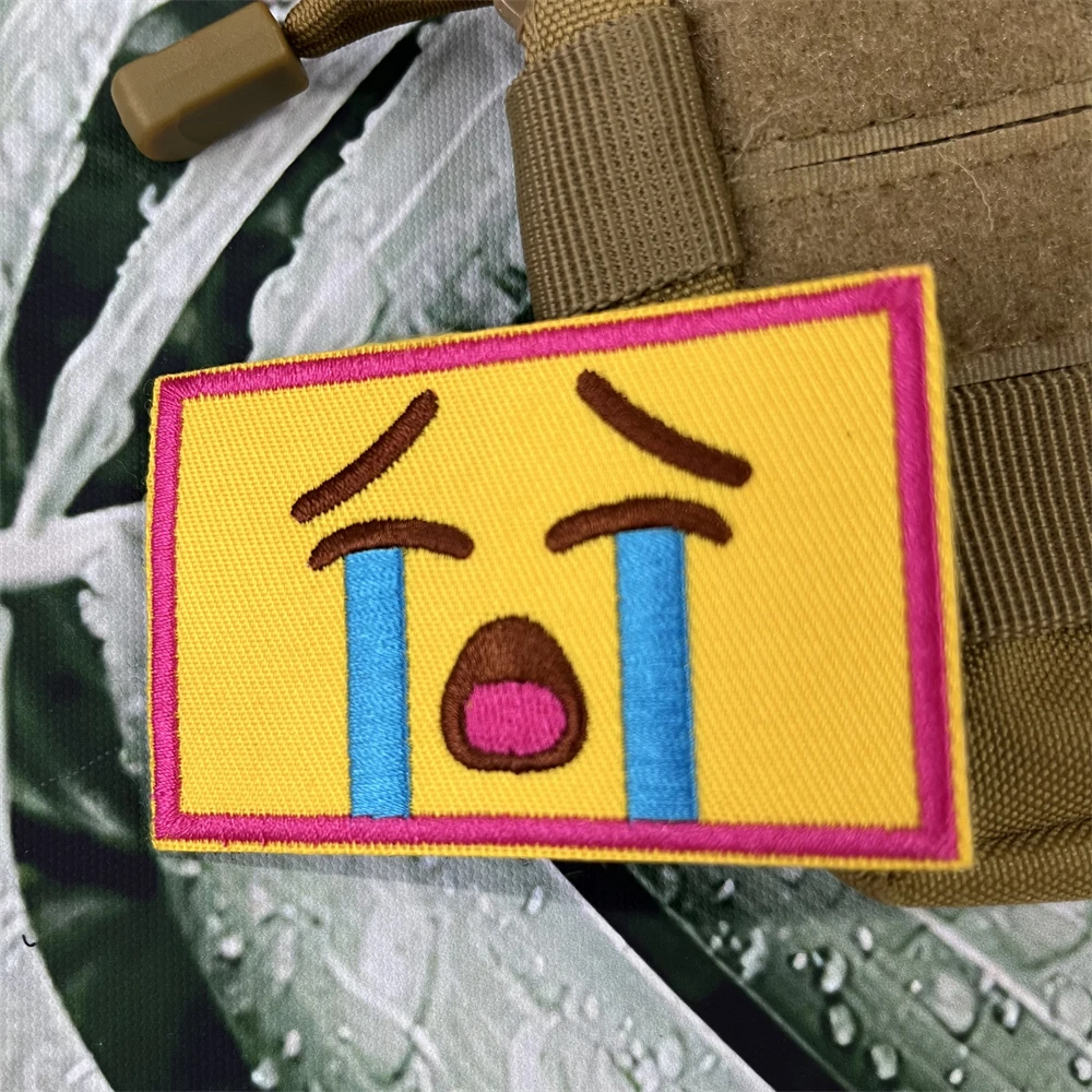 A Sad and Crying Face Embroidered Patches Military Backpack Hook&Loop Tactical Morale Emblem Sticker