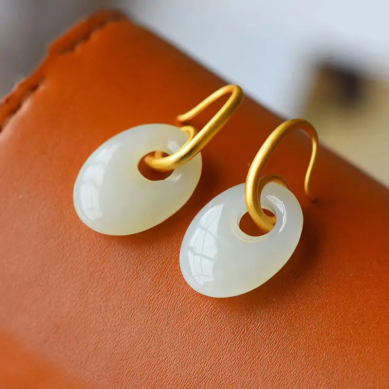 

Original natural and Baitian white jade oval hollow Earrings Chinese style retro creative elegant women's Christmas gift