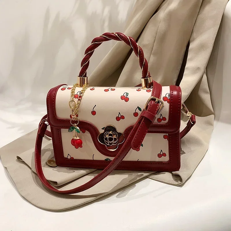 This Is A Red Handbag with A Cute Cherry Design for Dating and Shopping.