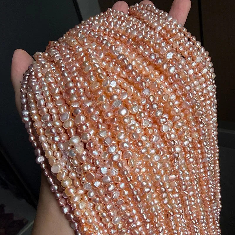 4-5mm multi-colored elongated 38cm pearls, smooth on both sides with side holes, coreless, approximately 80+ pieces.