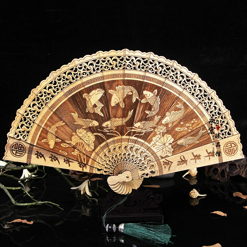 

Golden nanmu fan carved every year more than solid wood fan craft fan, summer fan