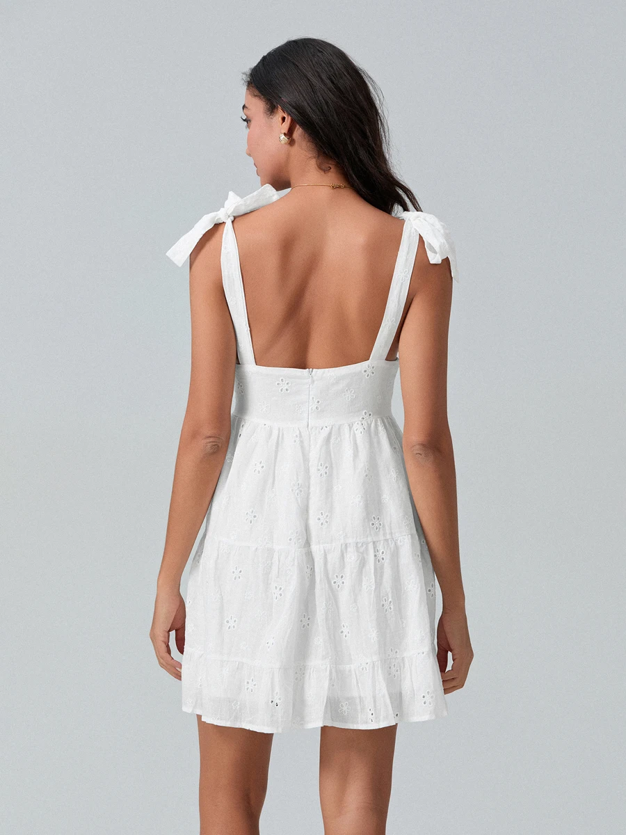 Elegant Sleeveless A-Line Dress with Bow Detailing V-Neckline and Eyelet Hem - Flirty and Chic Cami Dress for Women