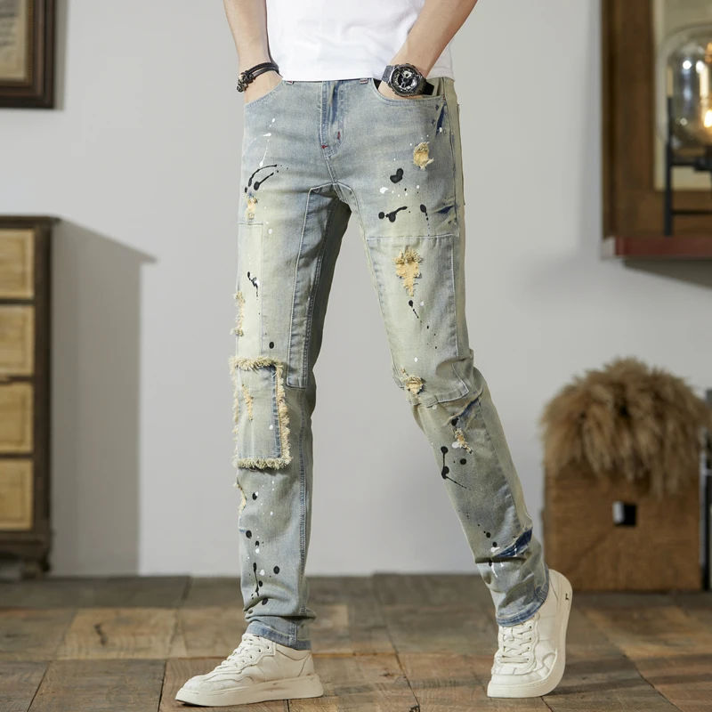 High quality stretch jeans retro and nostalgic splashed with ink spliced with patchwork fabric ripped motorcycle pants for men