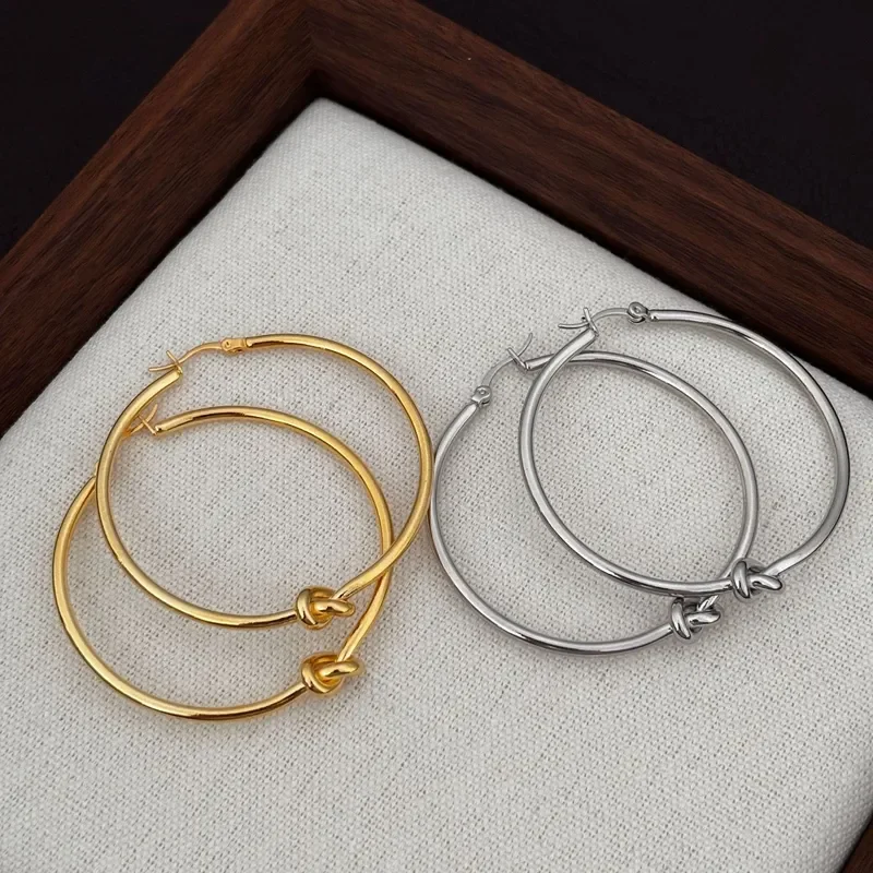 Simple double-knot thin ring ear buckle women's gold and silver two-color knotted ring large earrings European and American