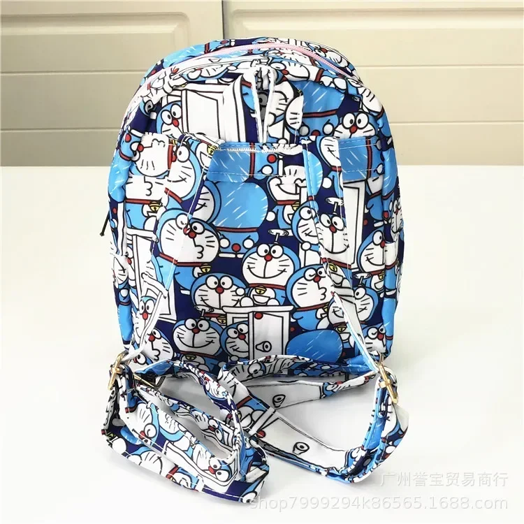 Mochila pequeña de dibujos animados Doraemon para niños, bolsa escolar pequeña impermeable para jardín de infantes, mini mochila Linda para niños y niñas, nueva