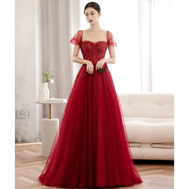 فستان نخب فرنسي للعرائس 2026 فستان خطوبة جديد باللون الأحمر الخمري فستان مأدبة للنساء لخريف/شتاء حزام عرض كبير