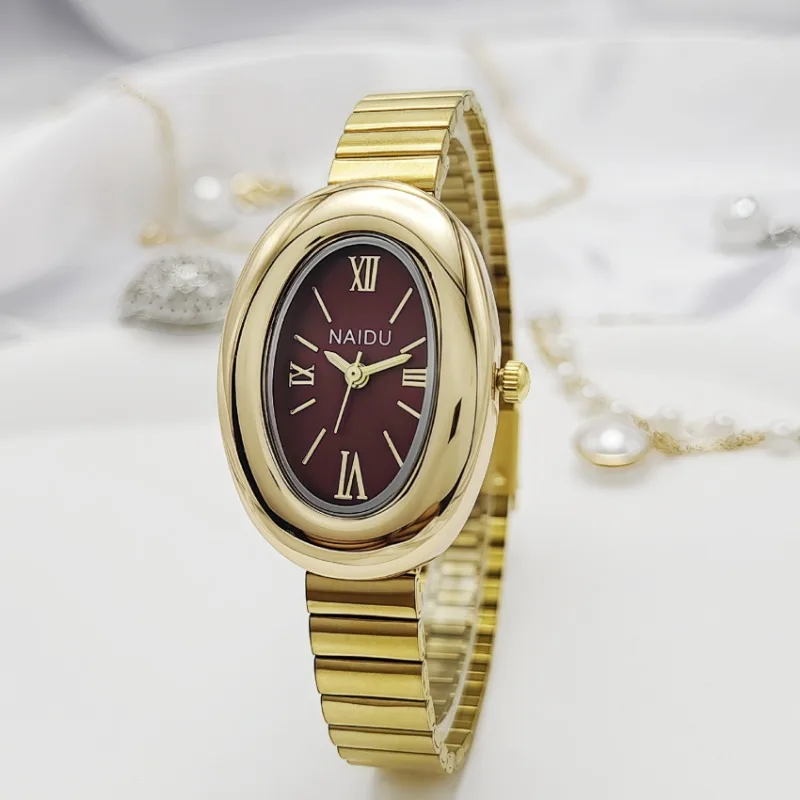 Nuovo orologio al quarzo da donna di fascia alta Orologio ovale in oro di lusso Orologio in acciaio inossidabile Orologio da donna Moglie Regalo di Natale