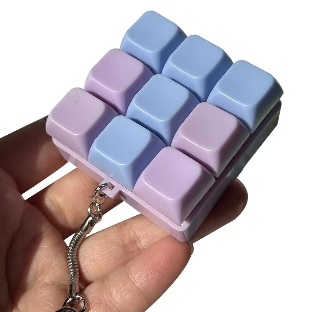 ‌ تململ المفاتيح لعبة 9 مفاتيح لوحة المفاتيح زر الإجهاد الإغاثة قلادة مكافحة القلق فنجر الصحافة قبعات للبالغين والأطفال