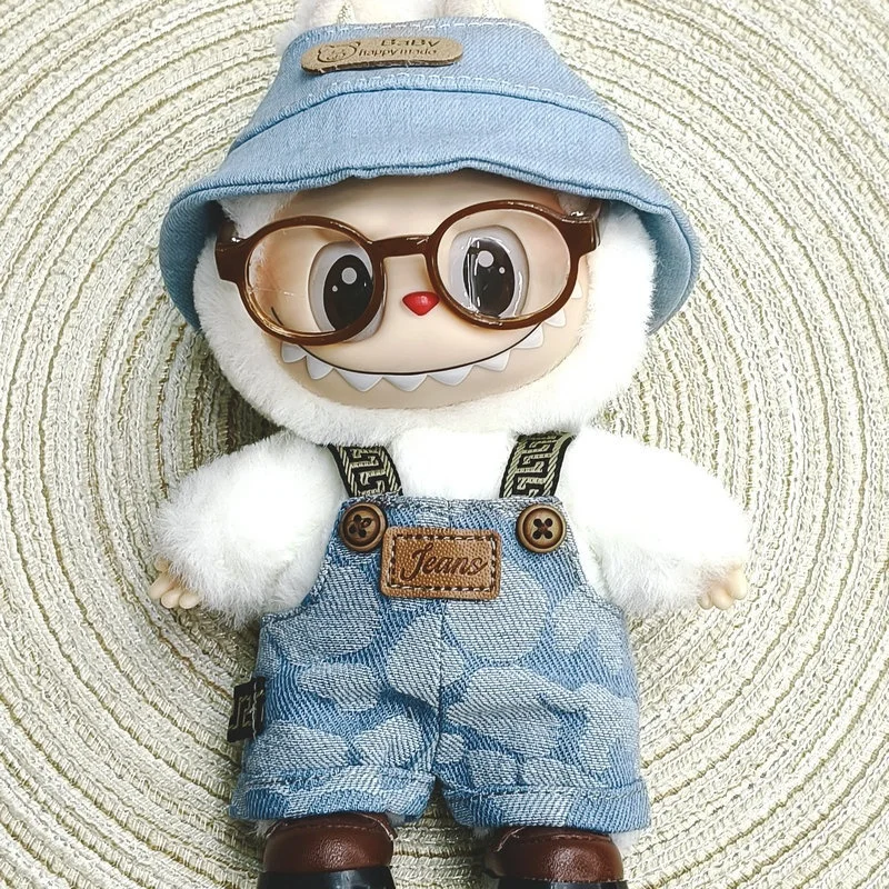 

Платье для куклы Labubu из прорезиненной ткани подходит для кукол высотой 17 см. Это милый комплект одежды для детей с повседневным дизайном.