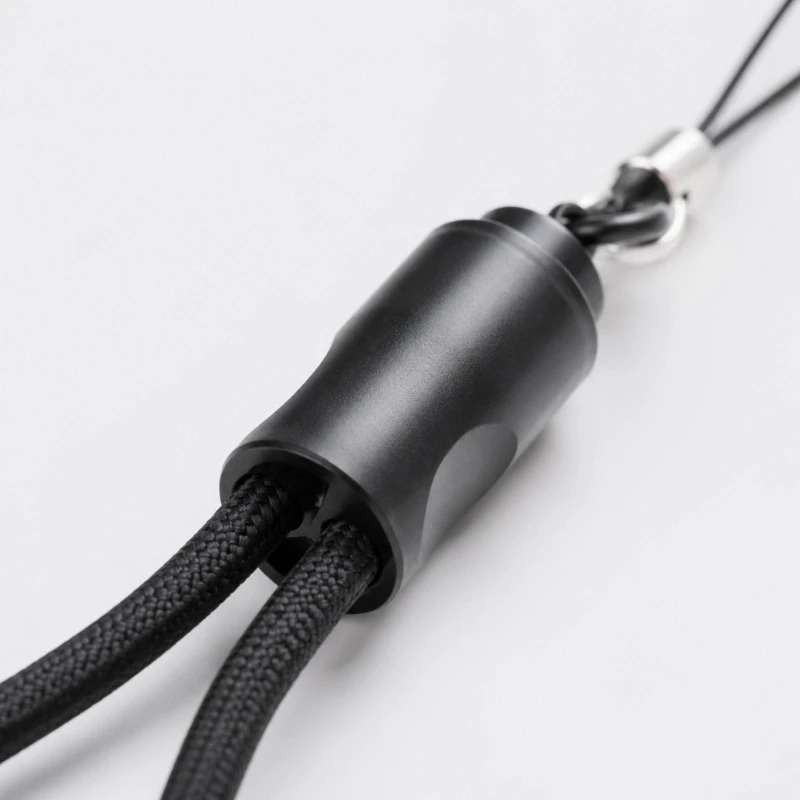 65 W USB C Charging and Data Cord with Interlaced Exterior, Storage Housing, and Bag or Hand Carry Attachment Design