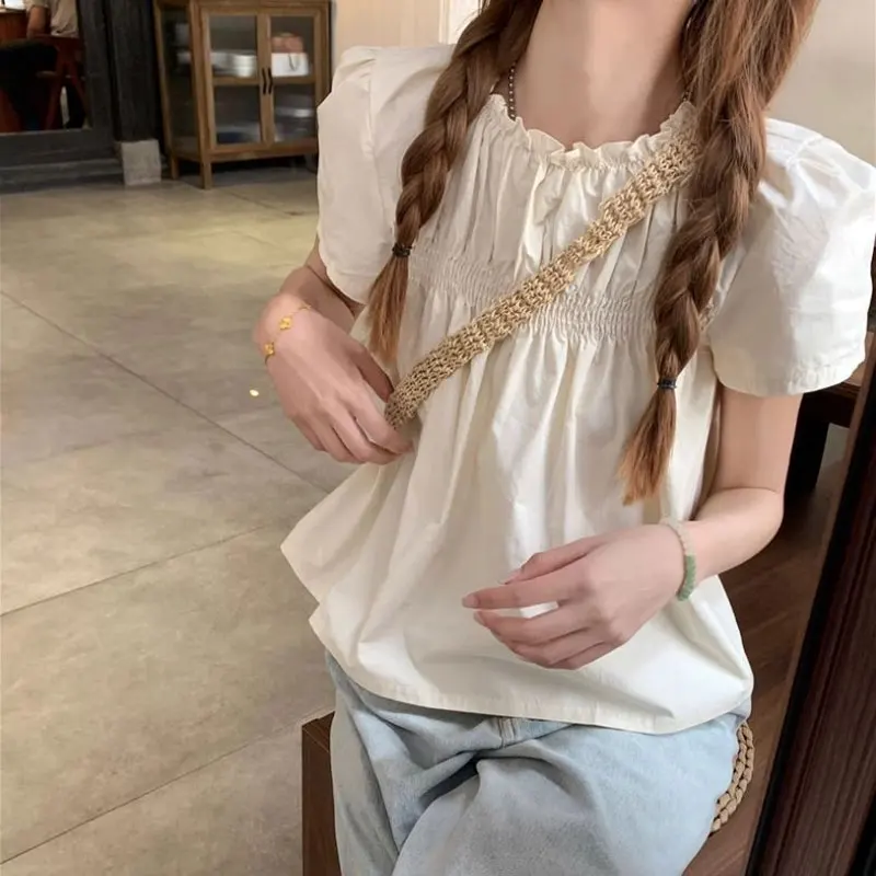 シャーリング無地シャツ女性服甘い半袖夏フレンチスタイルカジュアルひだルーズ O ネックブラウス新