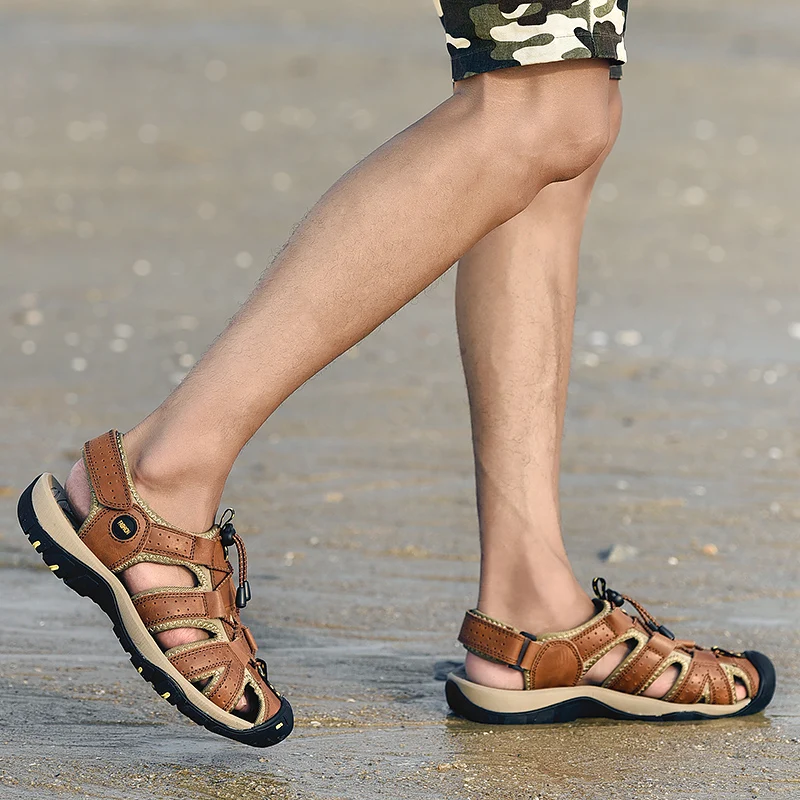 Summer Sandals Men\'s Baotou Beach Shoes Soft Soled Leather Anti Slip Outdoor Hollow Breathable Daily Casual Men\'s Shoes Slippers