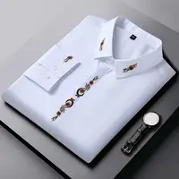 Camisa de manga larga con bordado informal inteligente, Tops holgados con cuello tipo Polo para primavera y otoño, blusa Vintage de talla grande, ropa de moda para hombre