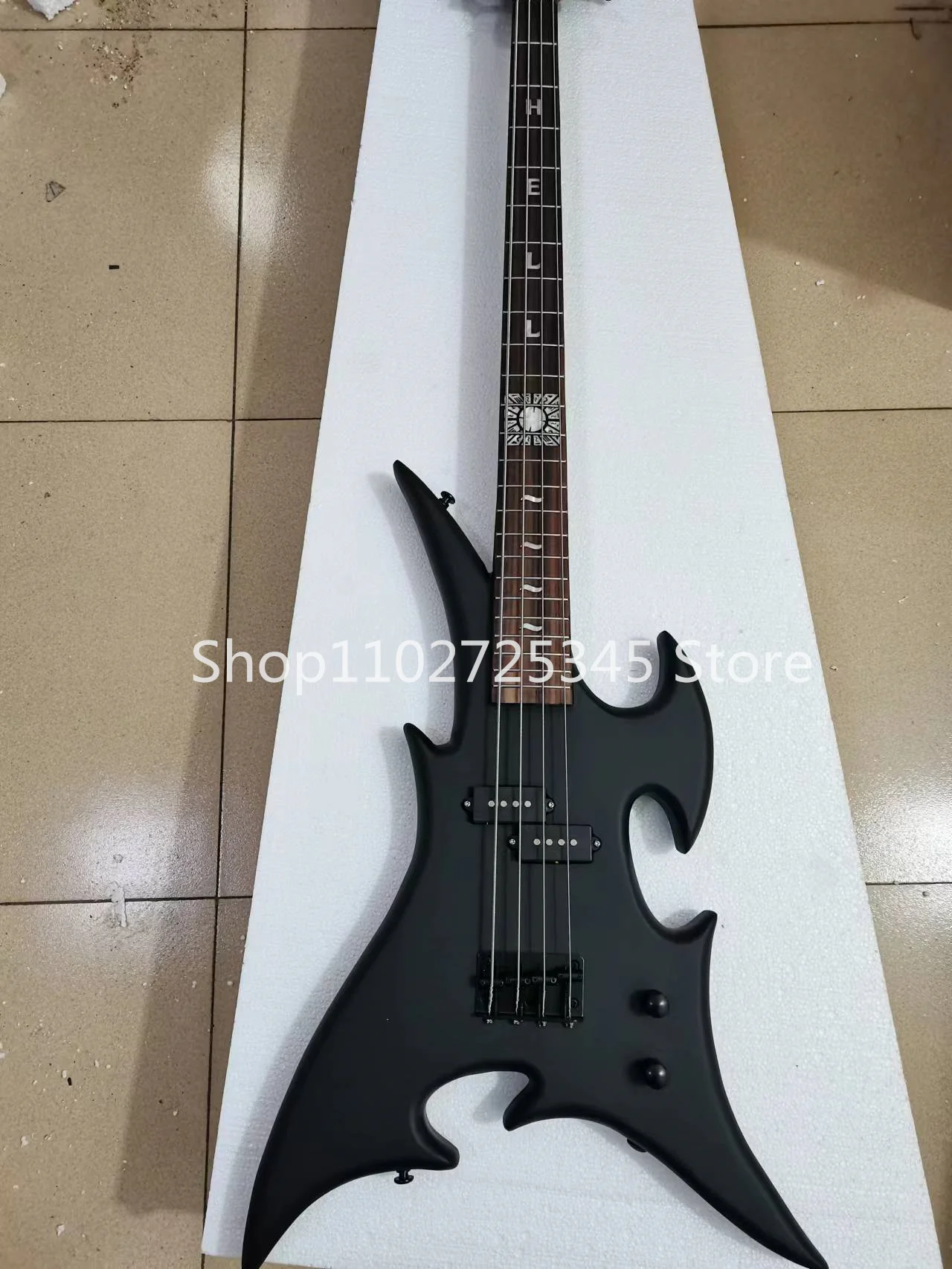 

4 string bass, matte black paint, black accessories, rose wood fingerboard, customizable