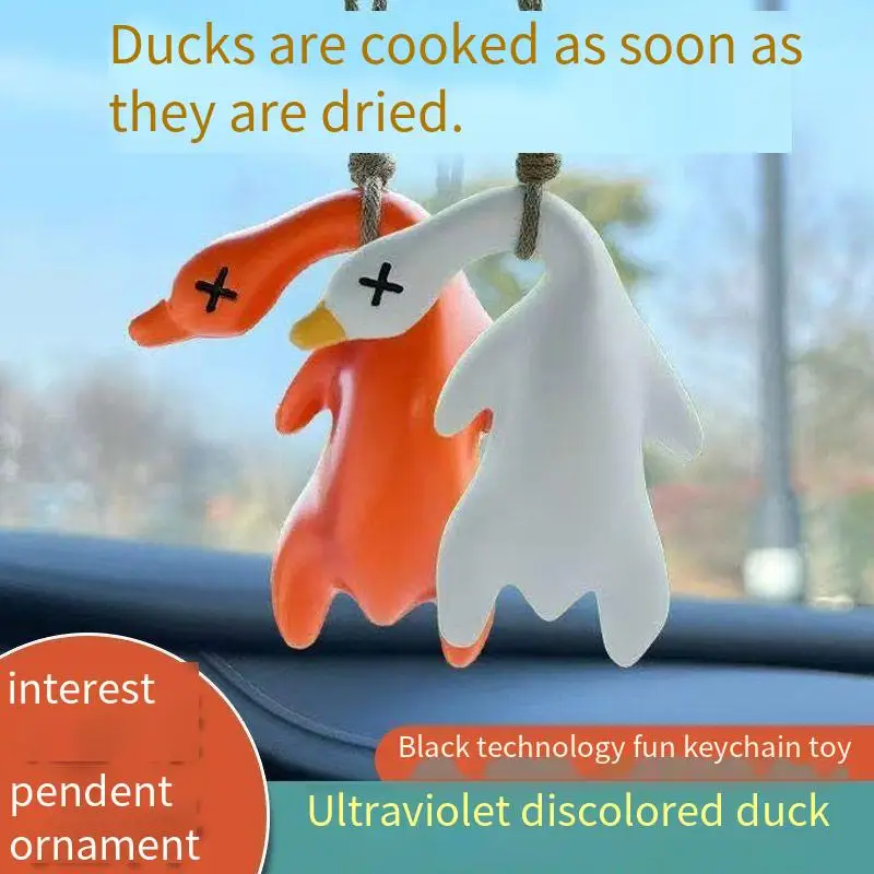 Color-changing roast duck pendant will change color when exposed to ultraviolet light. Interesting spoof roast duck key chain bl