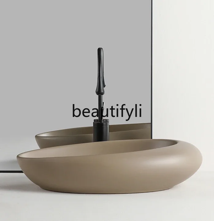 

On-stage basin Oval brown ceramic washbasin Balcony Bathroom Small sink