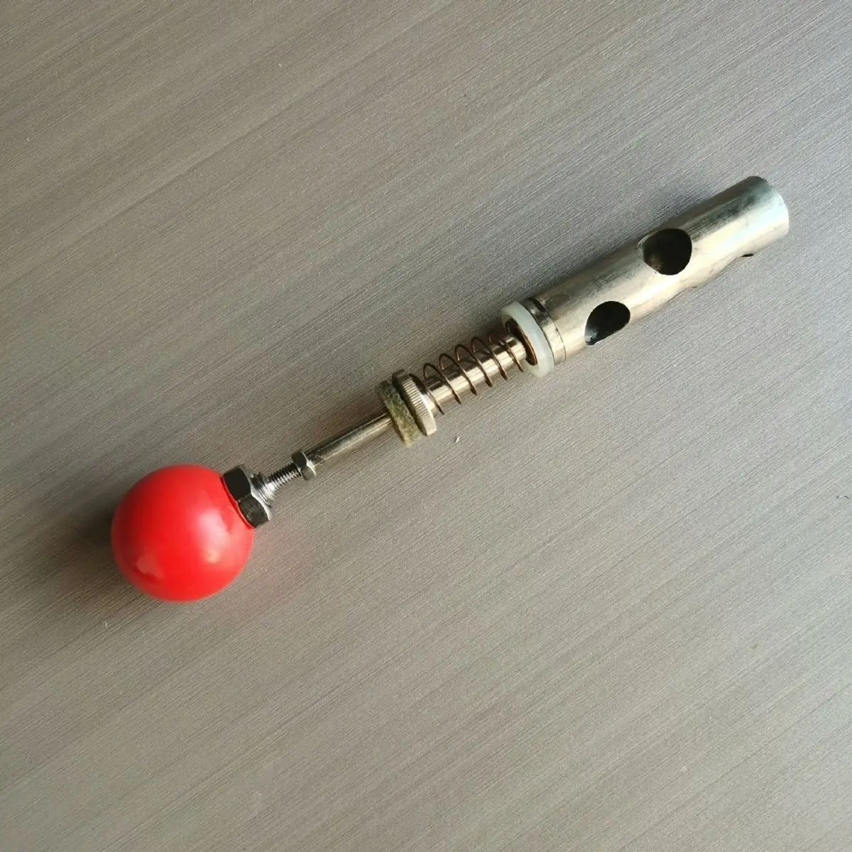 

Brass Instrument Maintenance Tool: Trumpet Piston Grinding Handle