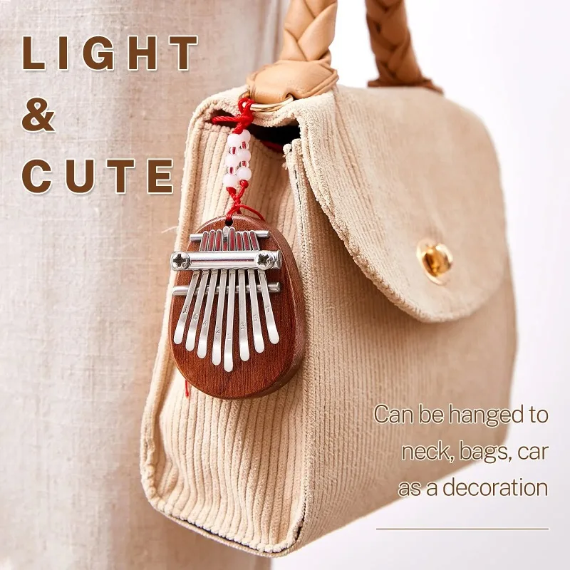 ミニ親指ピアノ 水滴スタイル かわいい楽器 ポータブル 絶妙な子供用ギフトセット 誕生日プレゼント 新しくて興味深い