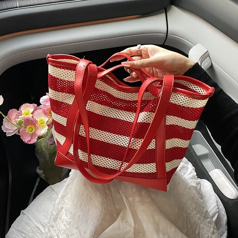 おしゃれな通勤用中空カラーブロックストライプ女性用トートバッグ夏シンプルカジュアル脇の下バッグpu素材ジッパーポケット