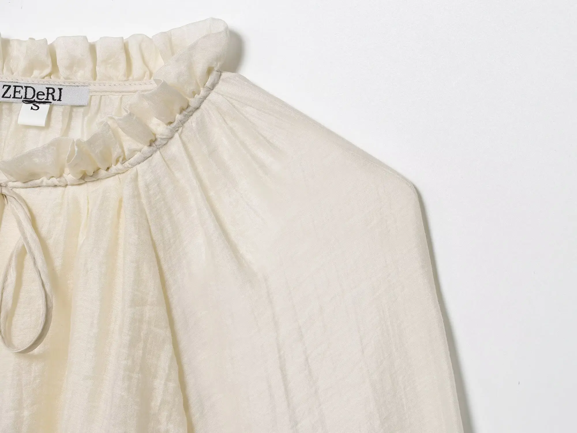 2025 moda de otoño para mujer, blusa semitransparente drapeada con mangas abullonadas, camisa holgada de tela Tencel minimalista elegante para mujer