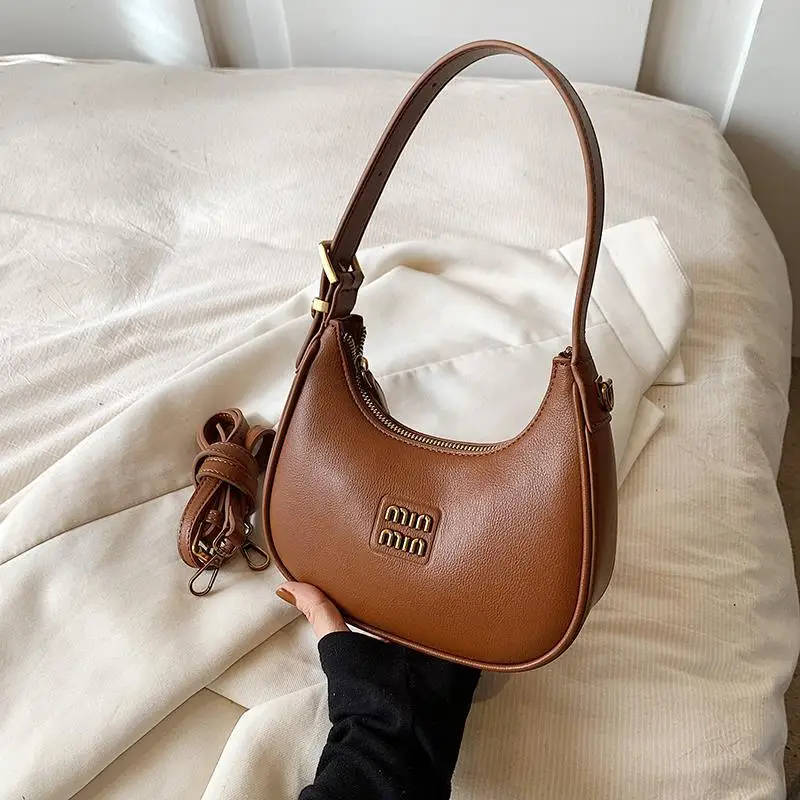 2025 new designer bags crescent-shaped bags, dumpling-shaped bags, commuter cross-body bags, hand-held bags over the shoulder