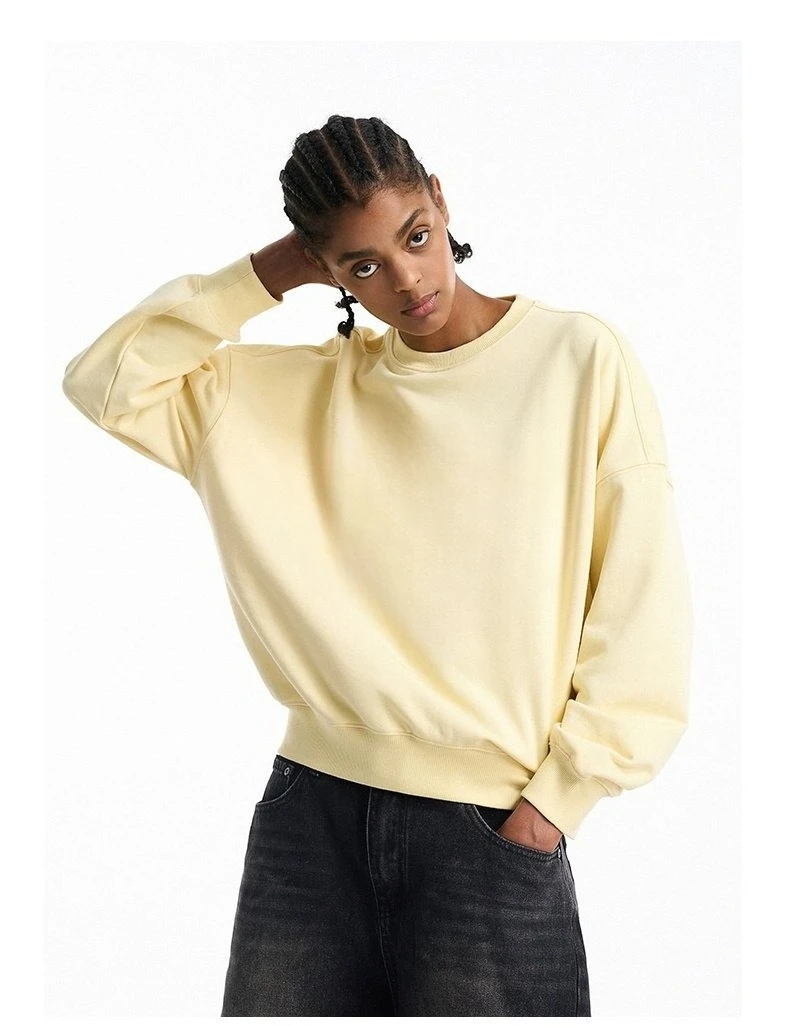 Camisa de camada base solta e casual com design versátil e elegante para tops outono inverno moletom com gola redonda de cor sólida