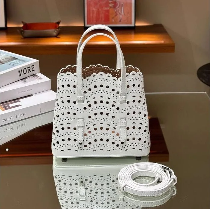 

Genuine Leather Handbag Hollow out Design Vintage Style Women's Shoulder Bag Soft Texture Strap Bucket Shape Chinese Brand