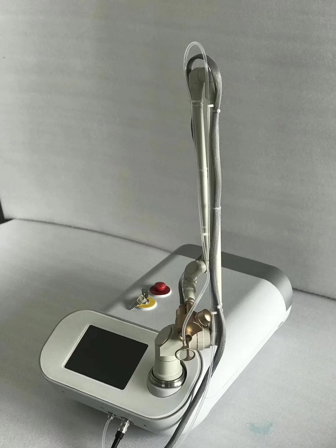 قطع غيار ماكينات ليزر Co2 أنبوب ليزر كسور Co2 60 وات Brazo Artivoado Laser De Co2 Fraccionado