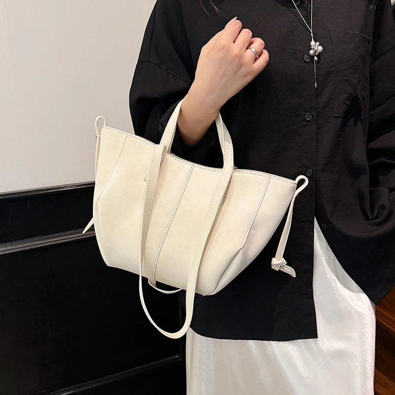 

Роскошная женская кожаная сумка-тоут для подгузников, винтажная сумка через плечо, минималистичная дизайнерская сумка большой вместимости, стильная и элегантная