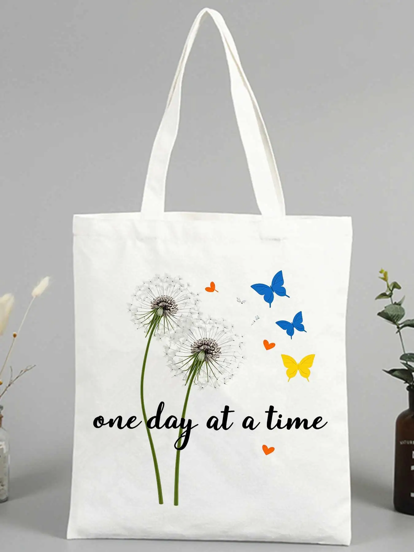Women's dandelion and butterfly print canvas tote bag, casual style for daily shopping and outings