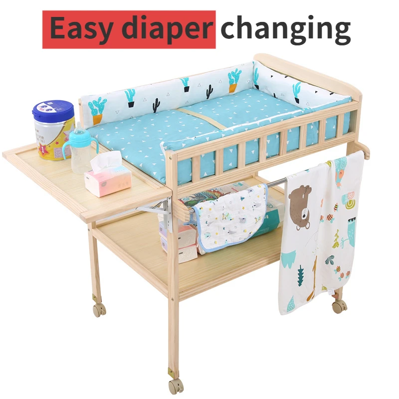 Solid wood multifunctional baby massage touch diaper table practical table mobile rack bassinet