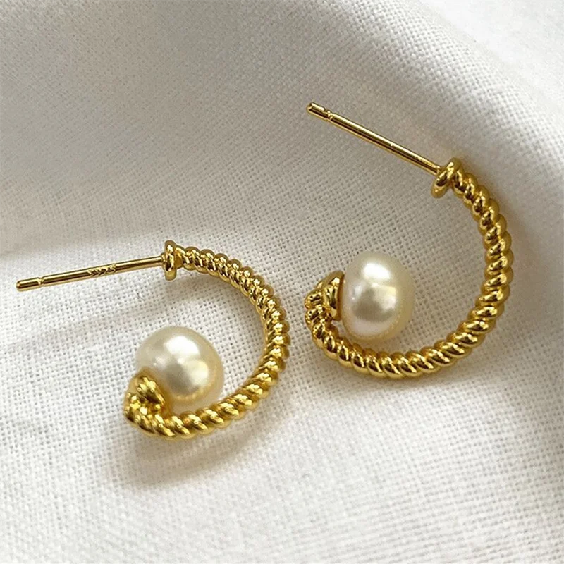 2023Retro braided curved hook metal Pearl earrings women simple studs