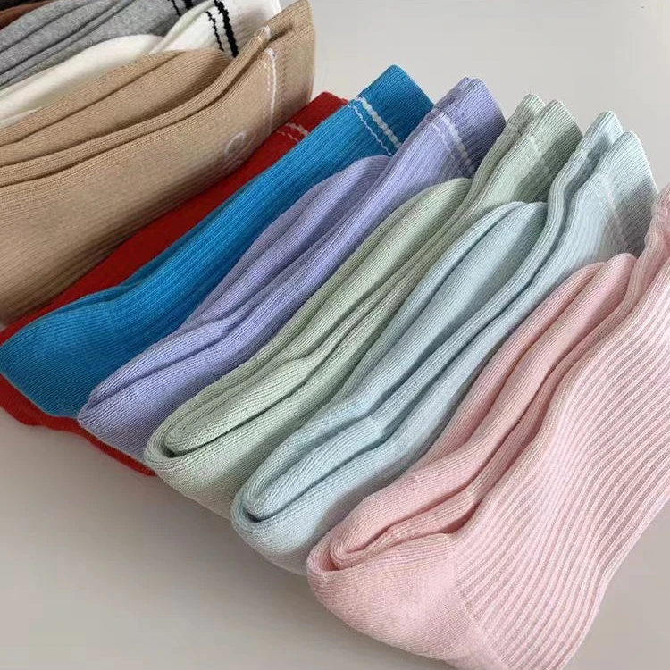 

Бренд 2 пары нейтральных носков для йоги Спортивные повседневные носки для йоги Хлопковые спортивные носки Сезонные унисекс Черно-белые длинные трубки 18 см