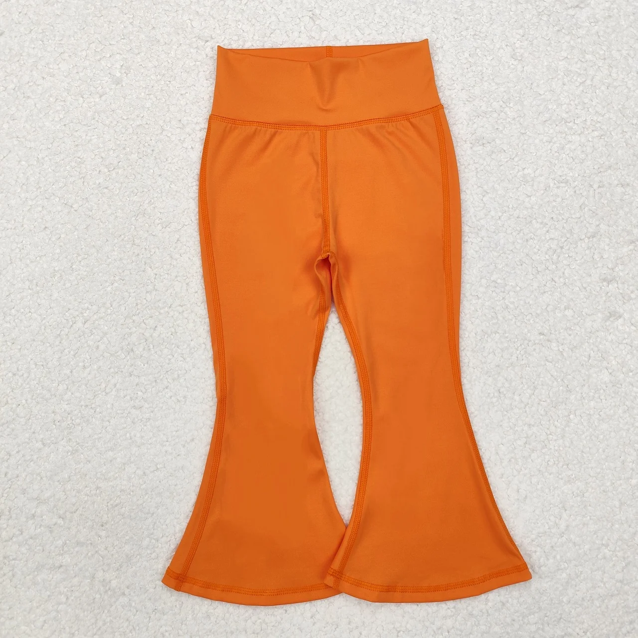 Venta al por mayor, ropa de primavera y otoño para niños pequeños, pantalones naranjas para niñas, ropa activa infantil, pantalones con parte inferior acampanada