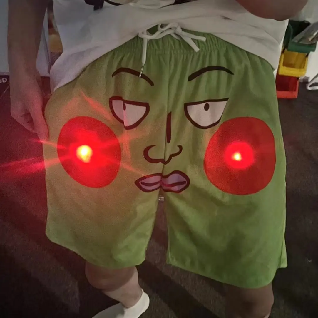 

Светящийся комплект одежды с мультяшным принтом: футболка и шорты. Милый дизайн с животиком Пуи, светящийся в темноте, повседневный свободный крой для молодежи.