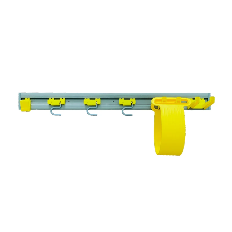 The boxed tool kit includes yellow elongated components and multiple matching small parts