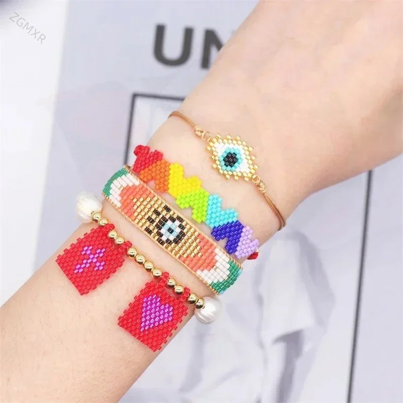 سوار حبة الأرز التدرج اللون القلب أنثى قوس قزح الهندسة تصميم اللؤلؤ الحياكة اليدوية بوهيميا سوار مطرز الموضة
