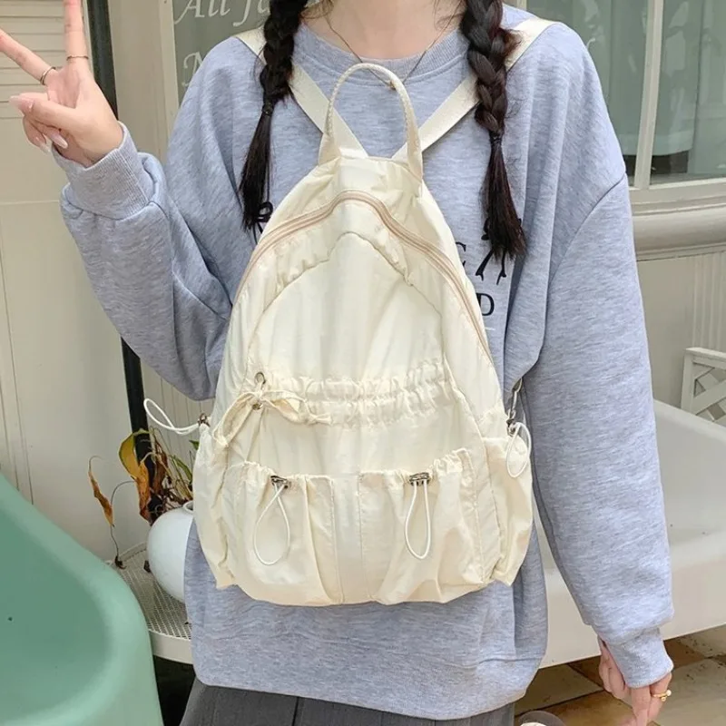 Mochilas casuais de nylon para mulheres, sólida leve, bolsas com todos os fósforos, bolsa macia de viagem, saída diária, moda Harajuku feminina