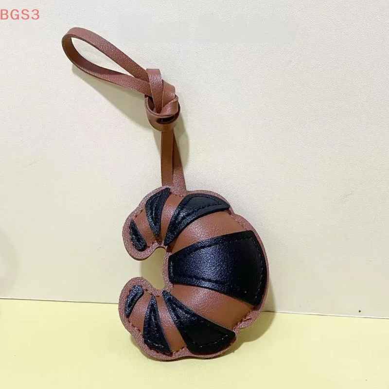 الإبداعية اليدوية متعدد الطبقات التصحيح الكرواسون الحبل المفاتيح الأمتعة قلادة حقيبة صغيرة