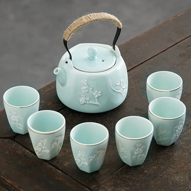Embossed Plum, Orchid, Bamboo, Chrysanthemum Kung Fu Tea Set with Simple Chinese Style Large Beam Teapot and Teacup